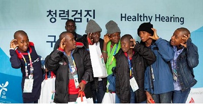 Athletes from Kenya at Special Olympics 2013 in South Korea in the Hear the World pose for conscious hearing
