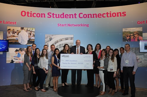 Oticon President Peer Lauritsen presents a $25,000 donation to the American Academy of Audiology Foundation&rsquo;s Empowering People scholarship fund