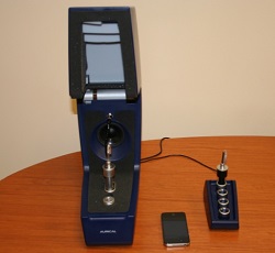 Set up, with left hearing instrument in the HIT box and right hearing instrument in the passive coupler