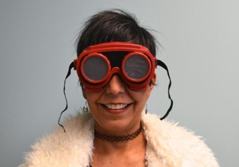 Michelle Nario-Redmond PhD displays low-vision goggles that simulate impaired visual acuity