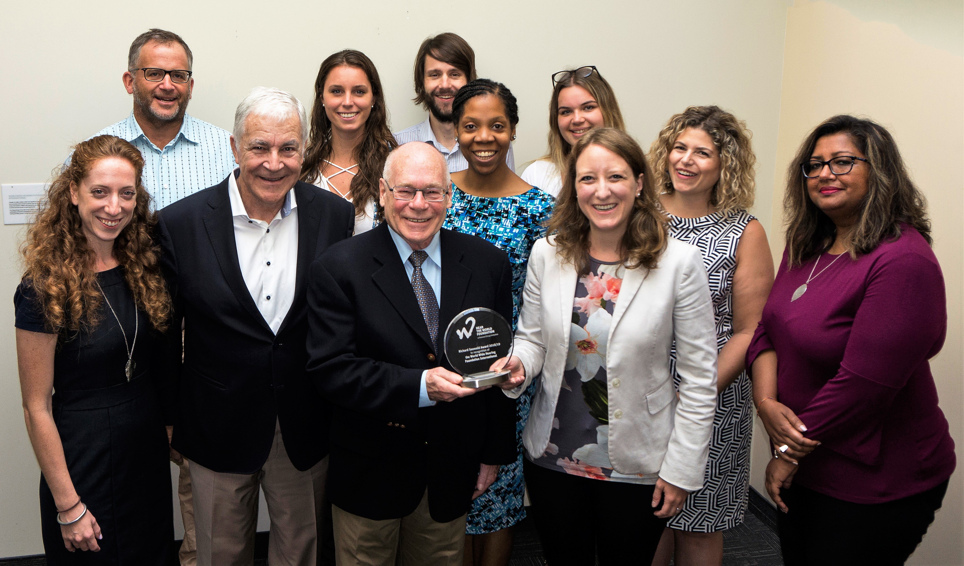 Award to World Wide Hearing and its recipients