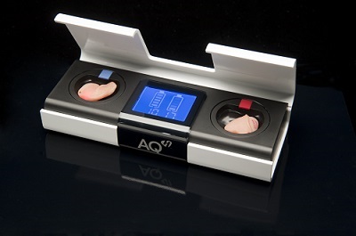 AQ ITE in its charger