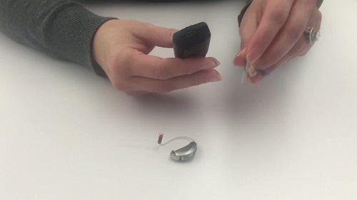 Screenshot of video showing how to sync up the SurfLink remote microphone to a set of Muse hearing aids