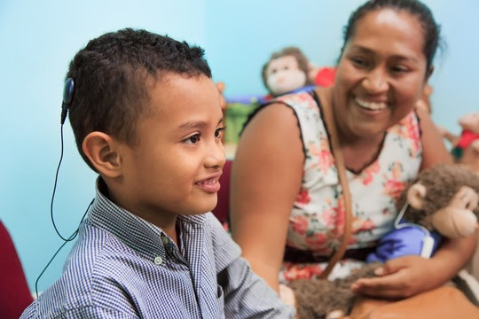 Alejandro after the successful activation of his cochlear implant