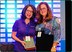 Dr. Morris presented Debra Abel the Joel Wernick Award