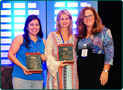 Dr. Morris presenting Kristin Davis and Alexandra Tarvin with the Craig W Johnson Audiology Advocate Award