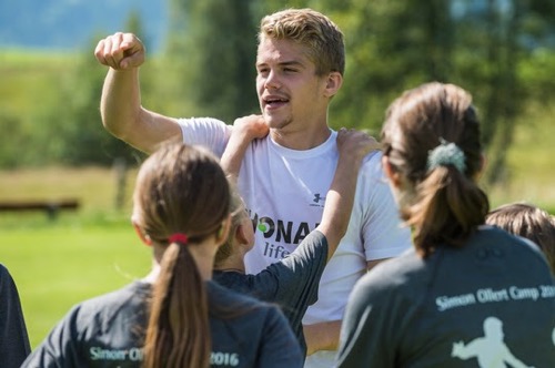 Simon Ollert at international soccer camp for children with hearing loss
