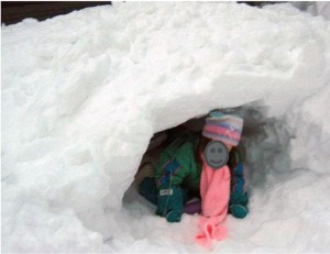 Child playing in the snow.