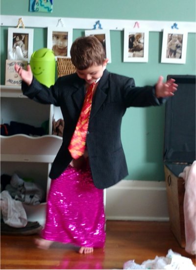 Child playing dress-up.