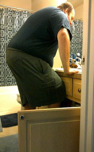 A position that causes less pain in his lower back