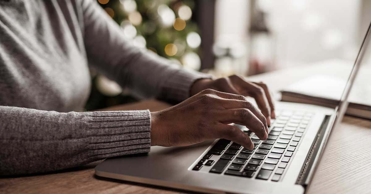 Person sitting at a computer 