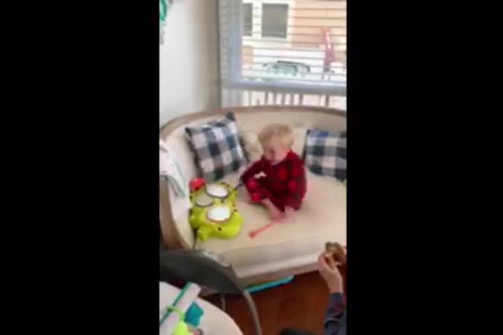 Video of young boy playing drum